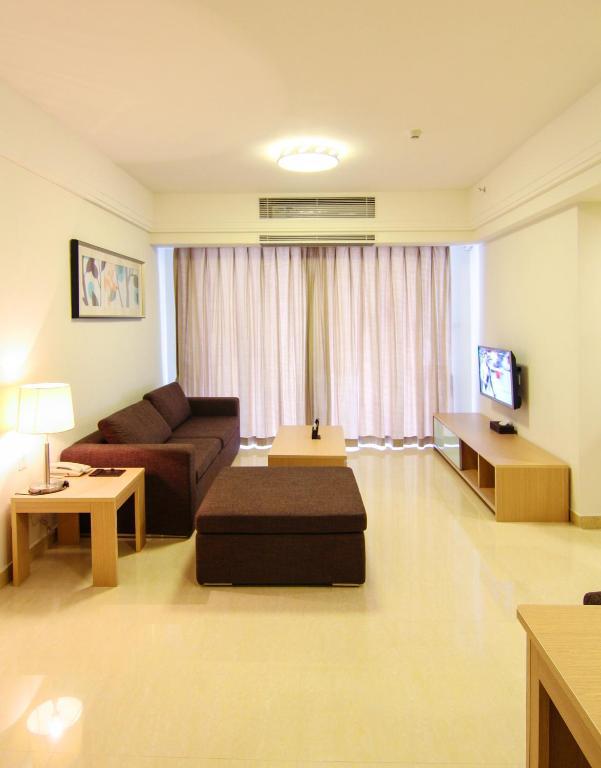 Xcellent International Serviced Apartment Guangzhou Rum bild